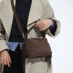 Bolso mini de ante con borlas