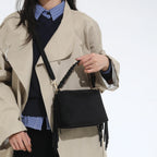 Bolso mini de ante con borlas