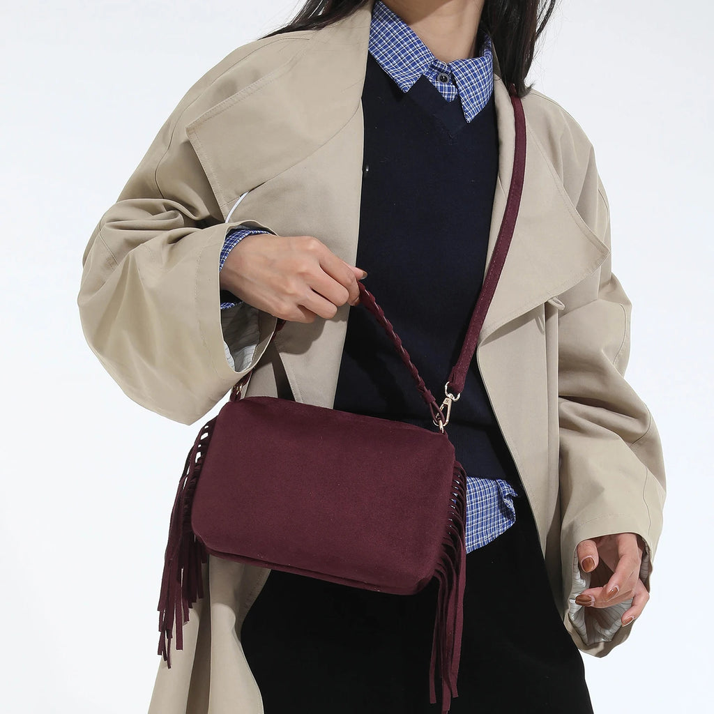 Bolso mini de ante con borlas