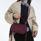 Bolso mini de ante con borlas